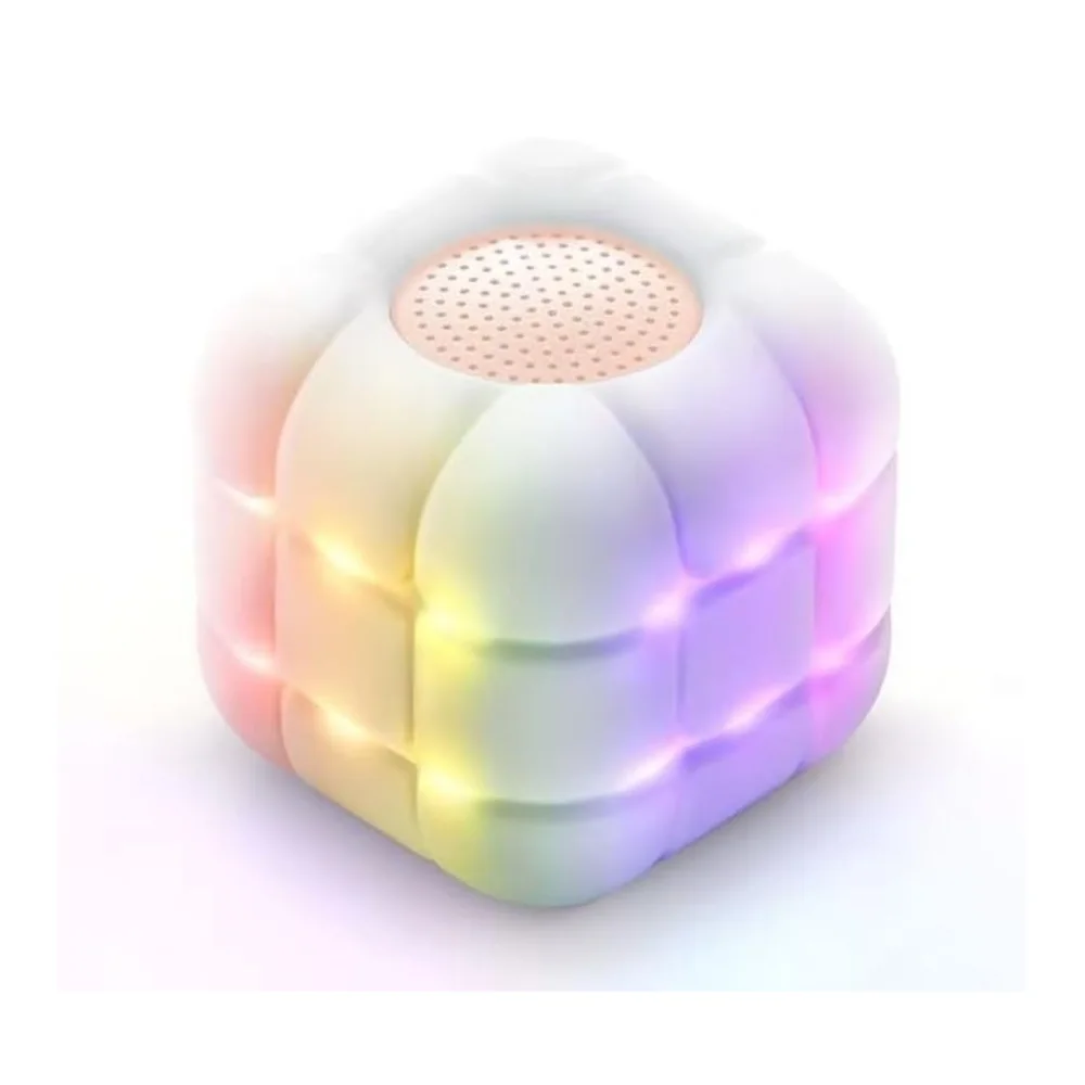 Happy Music Box, a soft white 3x3 cube speaker with a peach speaker grille and rainbow LED light between its squares
